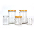 Empty round 585ml food grade glass honey jam chilli sauce storage jar with metal lid